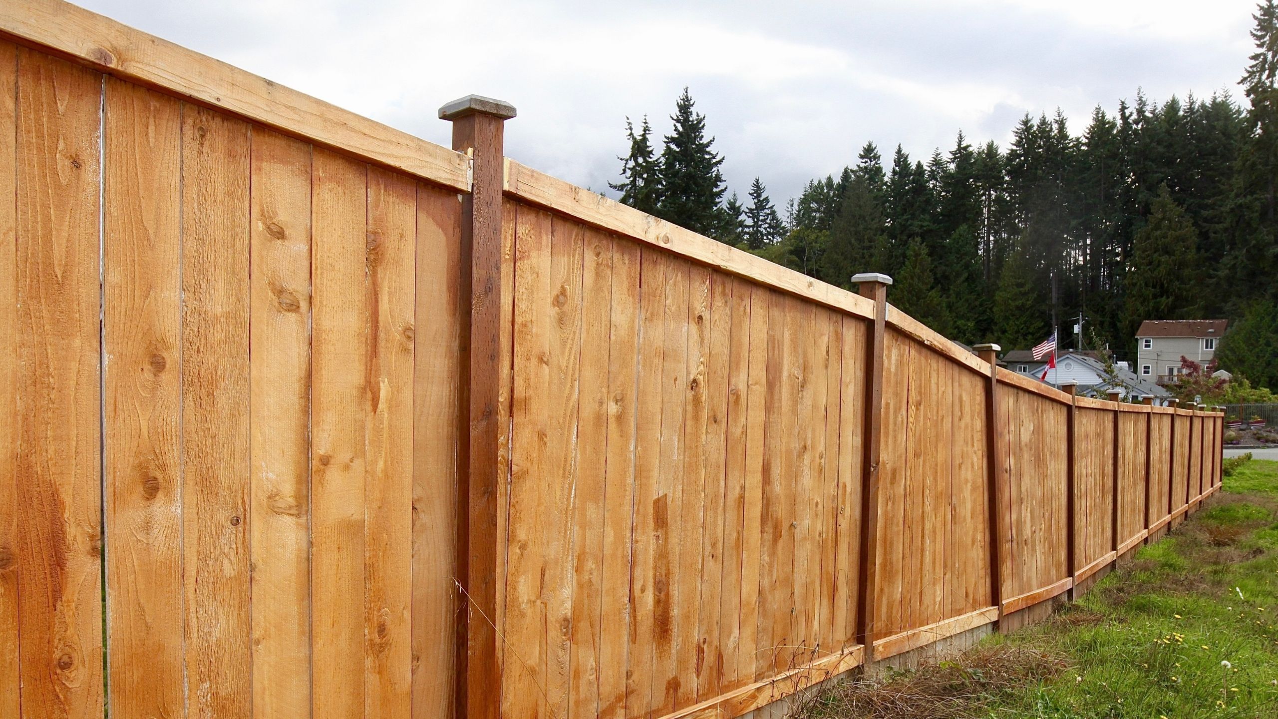 Cedar wood privacy fence installed along a Conroe Texas backyard